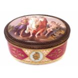 Vienna type lidded oval box, painted with classical figures and cherubs within raised paste gilding,