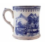 Staffordshire railway mug circa 1830, printed in underglaze blue with a steam engine and coaches,