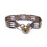 9ct gold four bar gate bracelet with padlock fastener, two twisted bars to centre, plain bars to