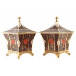 Pair of Caverswall lidded vases, of flaring square section decorated with Romany pattern in a