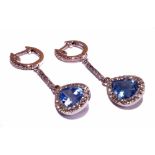 blue stone and diamond set 18ct white gold drop earrings, the teardrop blue stones framed by 23