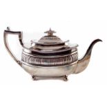 George III silver teapot by William Bennett, rounded rectangular body with fluted decoration on four