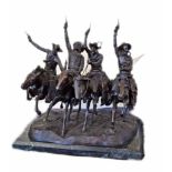 Large cast bronze sculpture with four cowboys riding horses, reproduction of Remington original