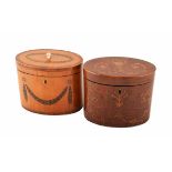 Two early 19th century oval section tea-caddies. One veenered in beech wood, the other in