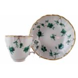 Bristol coffee cup and saucer circa 1780, painted with green rose swags, blue cross mark to base, (