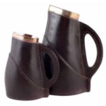 Two Doulton stoneware jugs, made to look as if constructed from stitched leather and fitted with