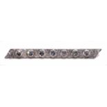 Art Deco style platinum and diamond bar brooch, 7 old cut diamonds in milgrain settings with three