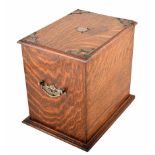 Early 20th century oak tobacco box. With steel escutcheon, handles and fretwork. The interior uses a