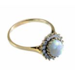 Opal and diamond oval cluster 18ct gold ring, central opal approx 9mm x 7mm, the oval cluster