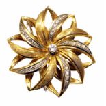 Circa. 1950's 18ct gold diamond set flower head brooch, round brilliant cut diamond to the centre,