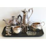 A collection of silver plated tea ware including coffee pot, tea pot and toast rack. We are unable