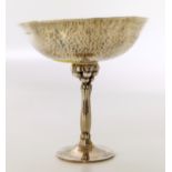 Hand hammered English silver tazza on stem with grape design. We are unable to provide condition