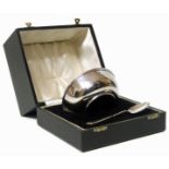 A boxed silver bowl and spoon 3.03oz We are unable to provide condition reports for this sale.