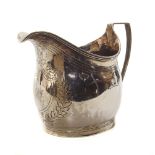 A silver milk jug We are unable to provide condition reports for this sale.