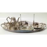 Oval silver plated tray, two plated chamber sticks with snuffers, three pieces of embossed Indian