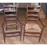A pair of arts and crafts oak framed open arm chairs Unfortunately we cannot do condition reports