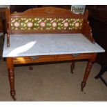 Marble top and tiled back wash stand 107cm wide. Unfortunately we cannot do condition reports for