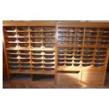 Bank of two haberdashery cabinets enclosing 45 and 36 dressing slides, each cabinet being 152cm