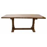 Peter "Rabbit Man" Heap refectory table with three plank adzed top, supported on two column