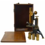 Microscope in brass by Thos. Armstrong and Bro. (Manchester), two supplementary lenses and one