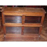 Early 20th century oak four door Wernike style bookcase. Unfortunately we cannot do condition