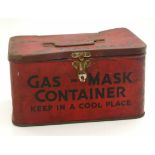 A WW2 red and black gas mask tin Unfortunately we cannot do condition reports for this sale.