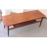 A 1970's teak coffee table 106cm x 36cm Unfortunately we cannot do condition reports for this sale.