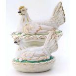 Two Staffordshire hen baskets with green bases and gilt decoration Unfortunately we cannot do