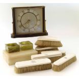 Ivory backed dressing table set, a mantle clock and a cigarette box Unfortunately we cannot do