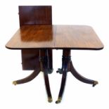 Edwardian Regency design mahogany twin pedestal dining table, top with single leaf supported on