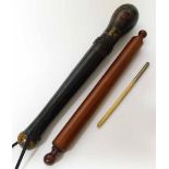 Black painted and gilt decorated V.R. Peelers type truncheon 34cm long and roller containing dep pen