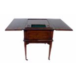 Edwardian mahogany surprise table, the patent design with two opening flaps to top activating rise