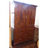 19th century mahogany linen press with two slides, the base having two short and two long drawers to