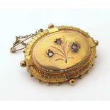 Gold brooch with diamond chips Unfortunately we are not doing condition reports on this sale.