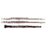 Rosewood oboe, also two flutes by Artley and Sapphire, all with cases, the oboe measures 54cm long.