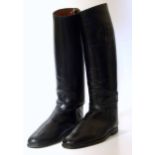 A pair of black leather hunting/riding boots size 11 with stretchers Unfortunately we are not