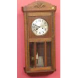 Early 20th century oak cased 8-day wall clock Unfortunately we are not doing condition reports on