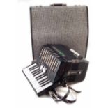 Delicia Junior II Accordion in case, the instrument measures 34.5cm wide.