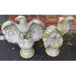 Pair pre-cast eagles on plinth. Unfortunately we are not doing condition reports on this sale.