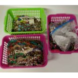 A large collection of costume jewellery in three baskets Unfortunately we are not doing condition