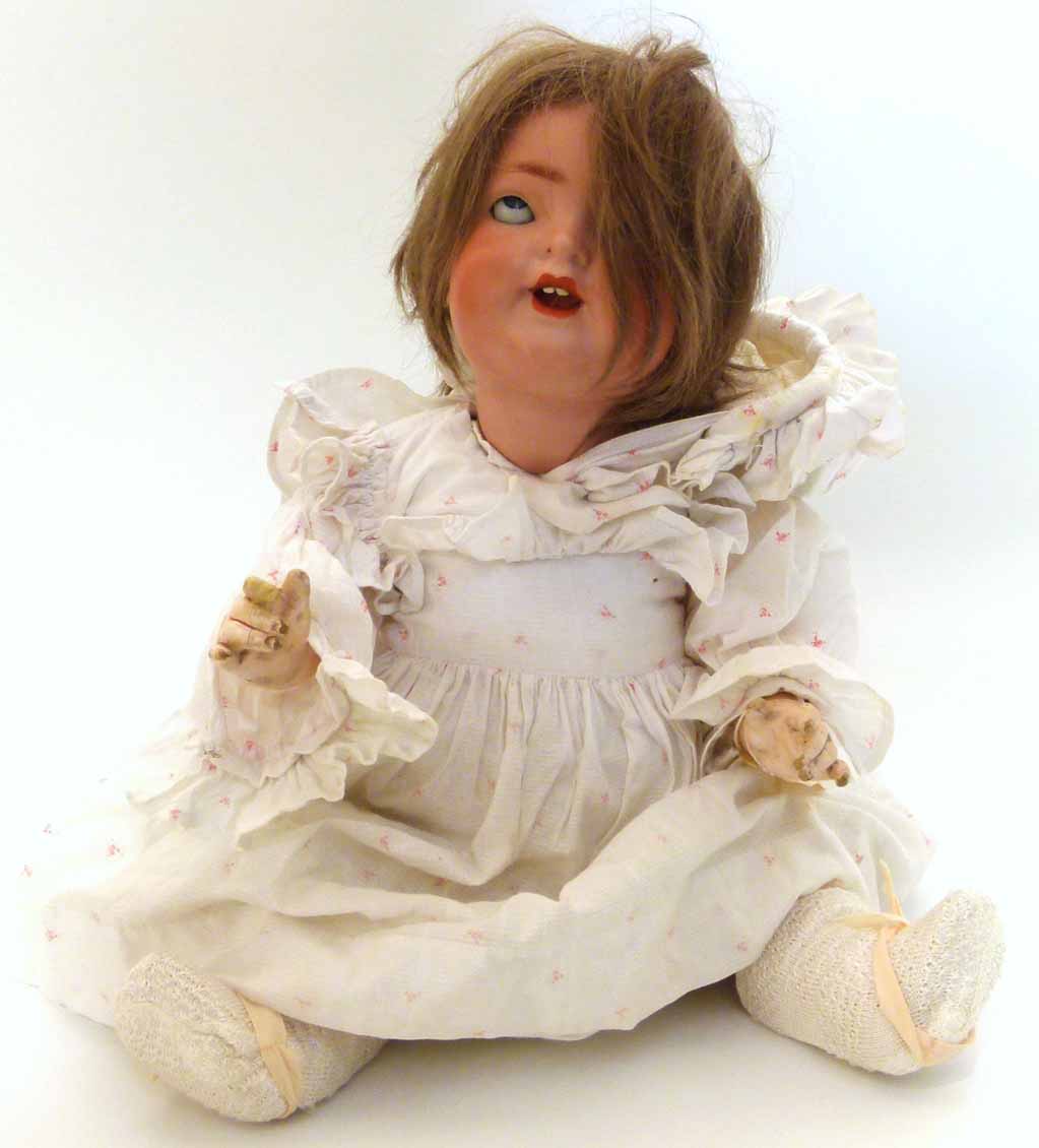 Porcelain headed doll marked "Porcellan Fabrik Burggrub 170-6 1/2" Unfortunately we are not doing