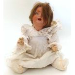 Porcelain headed doll marked "Porcellan Fabrik Burggrub 170-6 1/2" Unfortunately we are not doing