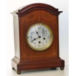 A mahogany three-train movement mantle clock with Westminster chime Unfortunately we are not doing