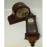 A mahogany mantle clock and a wall clock. Unfortunately we are not doing condition reports on this