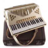 Hohner Pirola IVP piano accordion, in cream finish, with tolex type original case and period