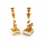A pair of French marble and ormolu mounted marble candlesticks. Corinthian columns wrapped in