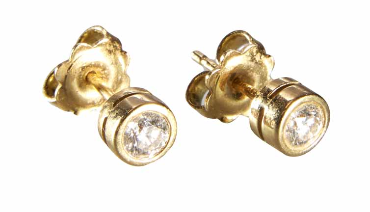 Pair of diamond solitaire 18ct yellow gold stud earrings, rub-over collette settings, the 2 round