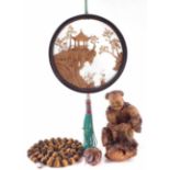 Collection of Chinese items, to include a root wood carving of a boy, tiger’s eye beads, a