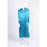 A silk Oriental robe in aquamarine, with traditional cherry blossom applique design. Size M.