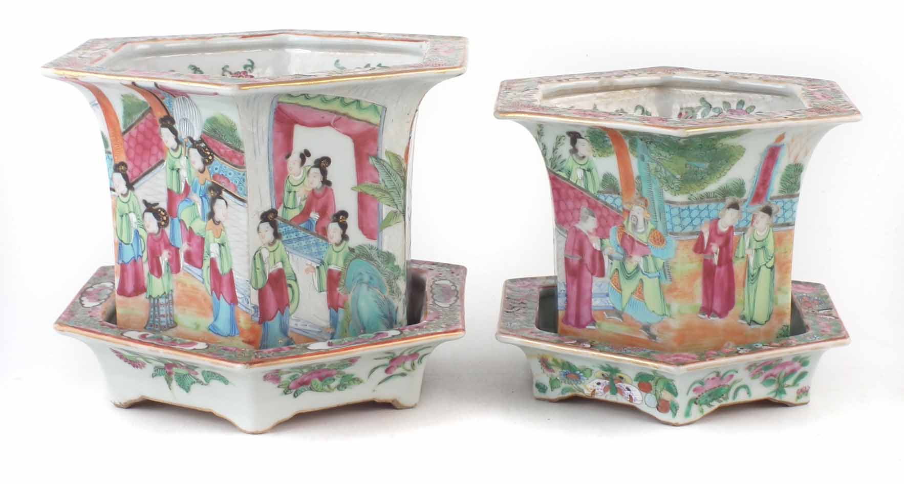 A pair of Cantonese jardinières and stands, of hexagonal form painted with Chinese ladies within